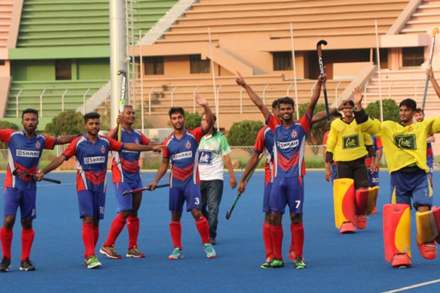 Players of Dhaka Mariner Young's Club team celebrating after beating Dhaka Abahani Limited at the Maulana Bhashani Hockey Stadium in the city on Tuesday	— bdnews24.com