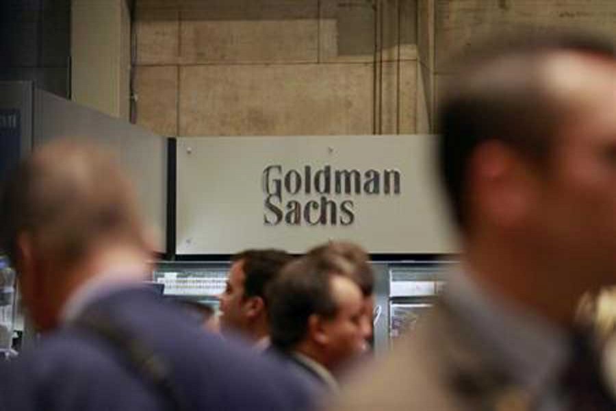 Traders work on the floor of the New York Stock Exchange near the Goldman Sachs stall, July 16, 2010. Reuters/Files