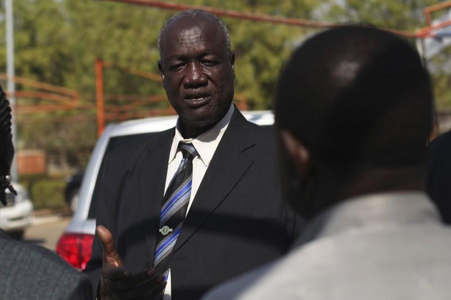 South Sudan's Defence Minister Kuol Manyang Juuk, talks to cabinet members after a cabinet meeting in Juba January 17, 2014. Reuters/File