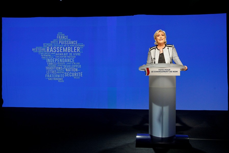French politician Marine Le Pen delivers a speech to announce the new name of the far-right National Front political party that becomes the National Rally (Rassemblement National) party. Reuters.