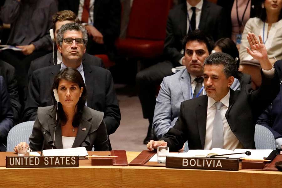 US Ambassador to the United Nations Nikki Haley vetoes a vote as Bolivian Ambassador Sacha Llorenty votes for a Arab-backed resolution for protection of Palestinian civilians during a Security Council meeting at UN headquarters in Manhattan, New York, US, June 1, 2018. Reuters