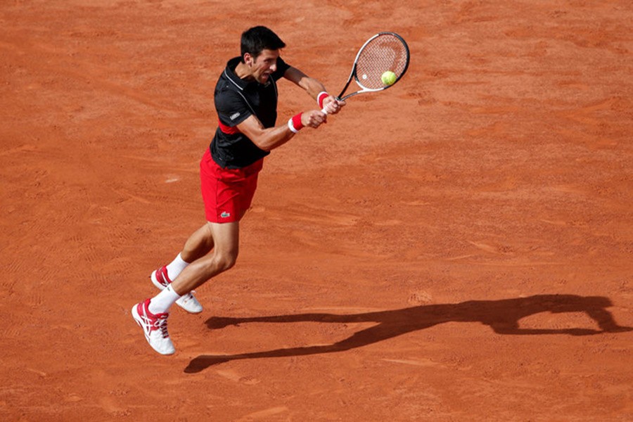 Serbia's Novak Djokovic in action during his fourth round match against Spain's Fernando Verdasco - Reuters photo