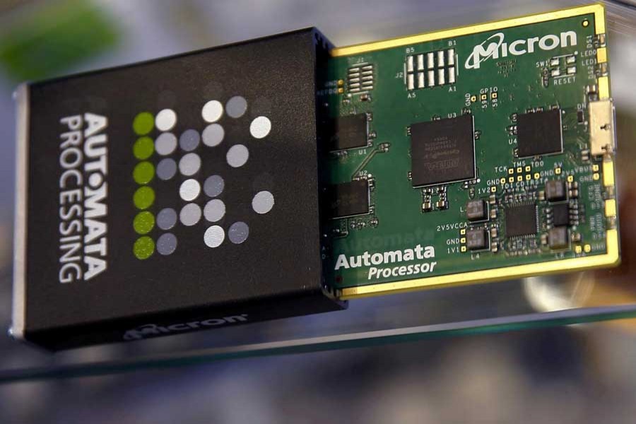 Memory chip parts of US memory chip maker MicronTechnology are pictured at their booth at an industrial fair in Frankfurt, Germany, July 14, 2015. Reuters/File Photo