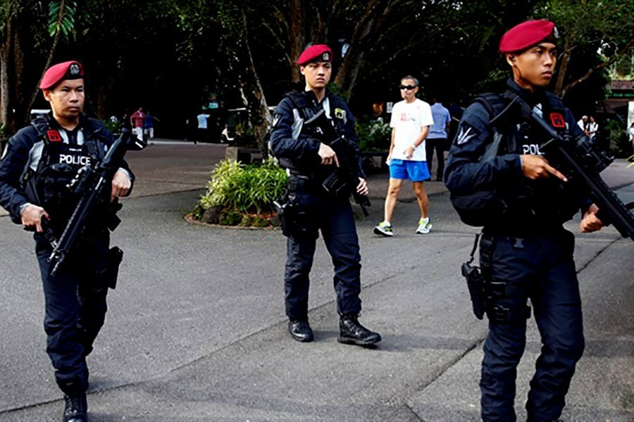 Singapore police arrest two South Koreans