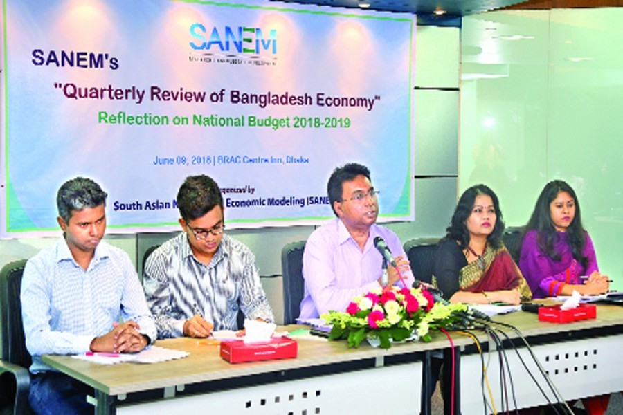 Dr Selim Raihan, executive director of SANEM, speaking at a press conference in the capital on Saturday