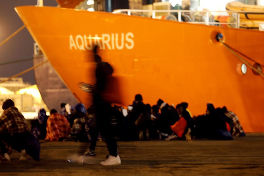 Migrants disembark from the MV Aquarius, a search and rescue ship run in partnership between SOS Mediterranee and Medecins Sans Frontieres, after it arrived in Augusta on the island of Sicily, Italy on January 30 last - Reuters/File