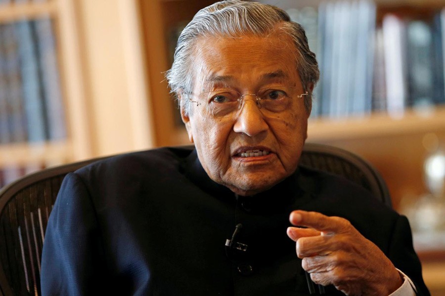 Former Malaysian prime minister Mahathir Mohamad speaks during an interview with Reuters in Putrajaya, Malaysia, March 30, 2017. Reuters.
