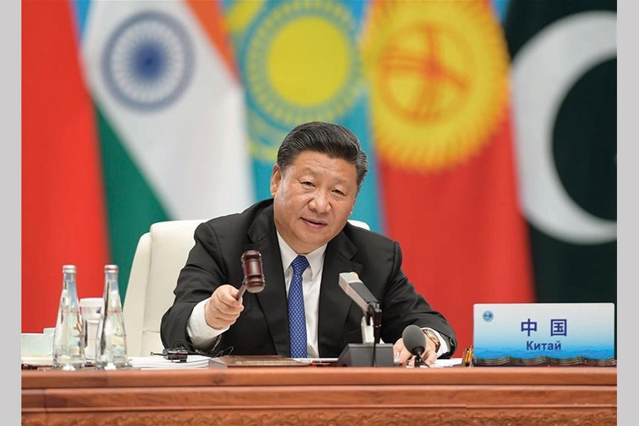 Chinese President Xi Jinping chairs the 18th Meeting of the Council of Heads of Member States of the Shanghai Cooperation Organization (SCO) in Qingdao, east China's Shandong Province, June 10, 2018. Xi delivered a speech during the meeting.  	— Photo: Xinhua