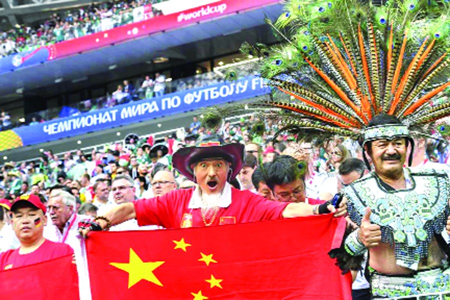 A Chinese fan lets his presence be known during the World Cup match between Germany and Mexico in Moscow	— Internet