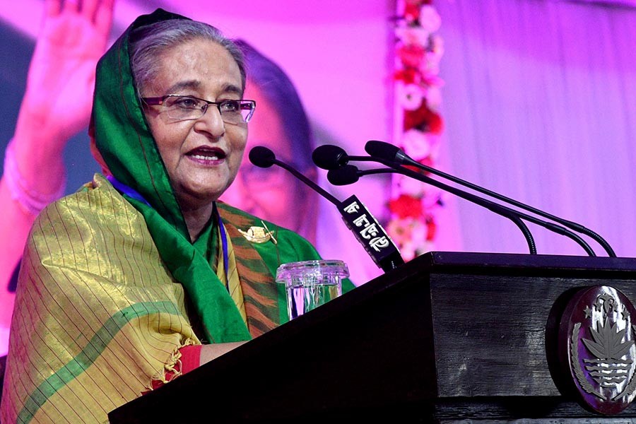 Prime Minister Sheikh Hasina speaking at a special extended meeting of Awami League at Ganabhaban in Dhaka marking the party’s founding day on Saturday. -Focus Bangla Photo
