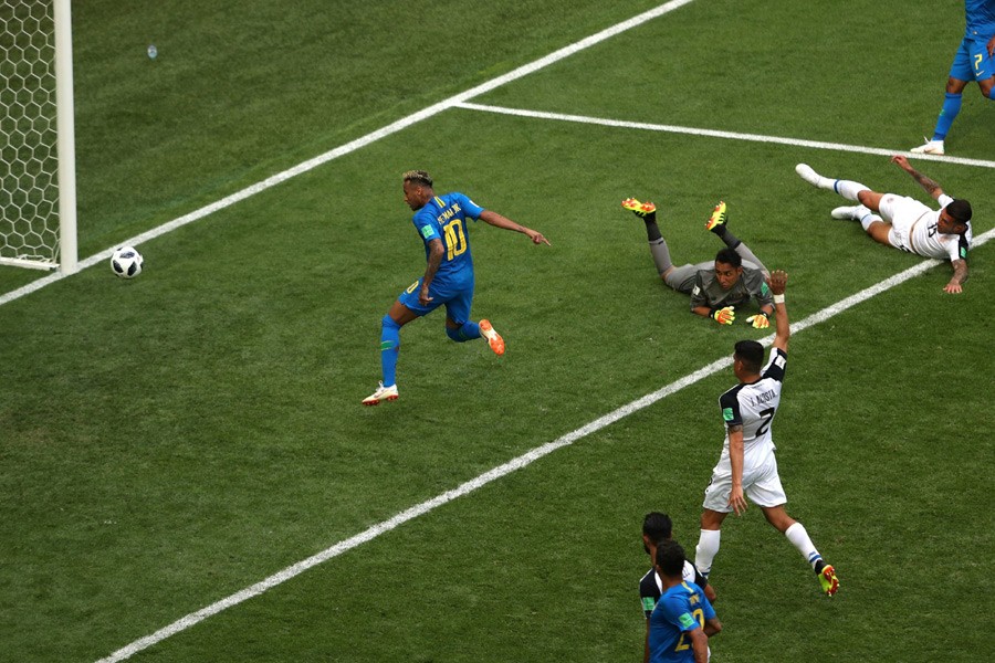 Neymar scores Brazil's second goal in injury time against  Costa Rica in Friday's World Cup match