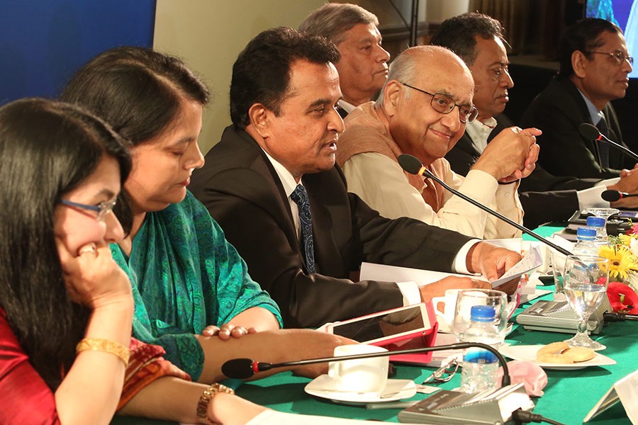 Planning Minister AHM Mustafa Kamal addressing a post-budget dialogue organised by the Centre for Policy Dialogue (CPD) at a city hotel on Sunday — FE photo