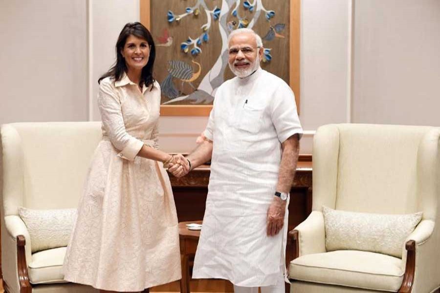 Indian Prime Minister Narendra Modi shakes hands with US Ambassador to the United Nations Nikki Haley before the start of their meeting in New Delhi, India, June 27, 2018. India's Press Information Bureau/Handout via Reuters