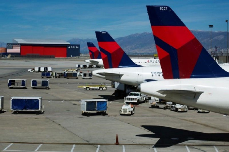 Delta planes line up at their gates while on the tarmac of Salt Lake City International Airport in Utah September 28, 2013. Reuters/File Photo