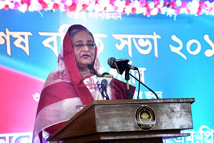 Prime Minister Sheikh Hasina addressing a special extended meeting of Awami League at Ganabhaban in Dhaka on Saturday. -Focus Bangla Photo