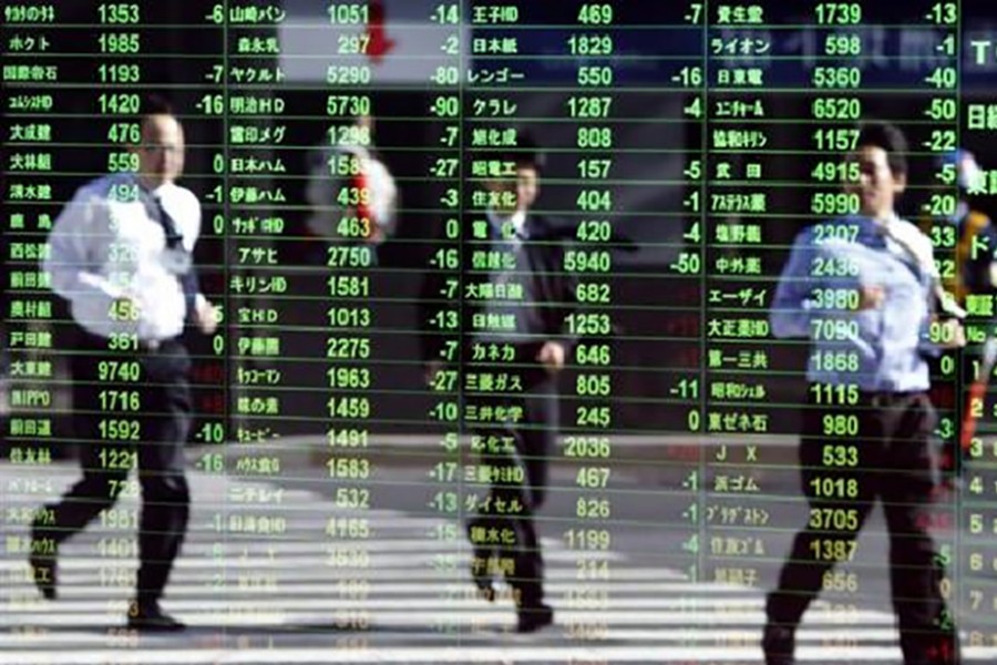 Asian shares fall after US stocks slide