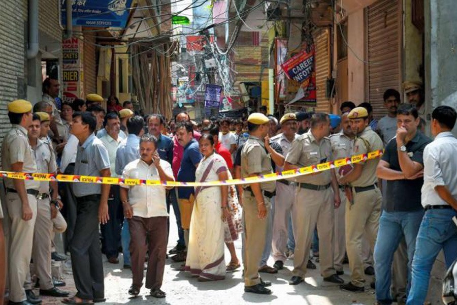 The 11 dead are members of the Bhatia family. They include 75-year-old Narayan Devi, her daughter, two sons, their wives and five grandchildren aged between 33 and 15. PTI photo.