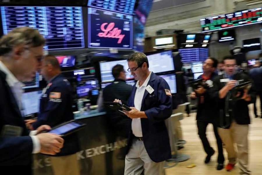 Traders work on the floor of the New York Stock Exchange (NYSE) in New York, US, July 6, 2018. Reuters