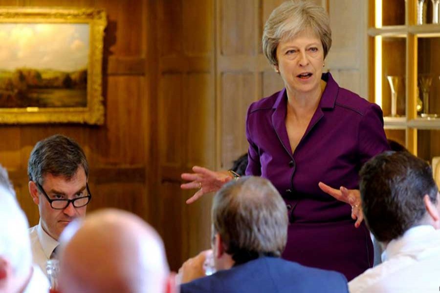 Britain's Prime Minister Theresa May commences a meeting with her cabinet to discuss the government's Brexit plans at Chequers, the Prime Minister's official country residence, near Aylesbury, Britain, July 6, 2018. Reuters
