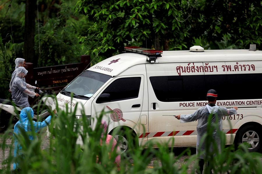 An ambulance departing from Tham Luang cave complex in the northern province of Chiang Rai of Thailand on Tuesday. -Reuters photo