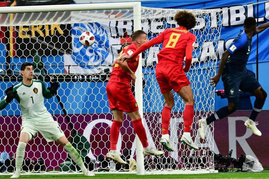 In the first semi-final of FIFA World Cup 2018 between France and Belgium at Saint Petersburg Stadium on July 10, Samuel Umtiti's 51st-minute header becomes the decisive factor that takes France into the World Cup final for the first time in 12 years. 	—Photo: Reuters