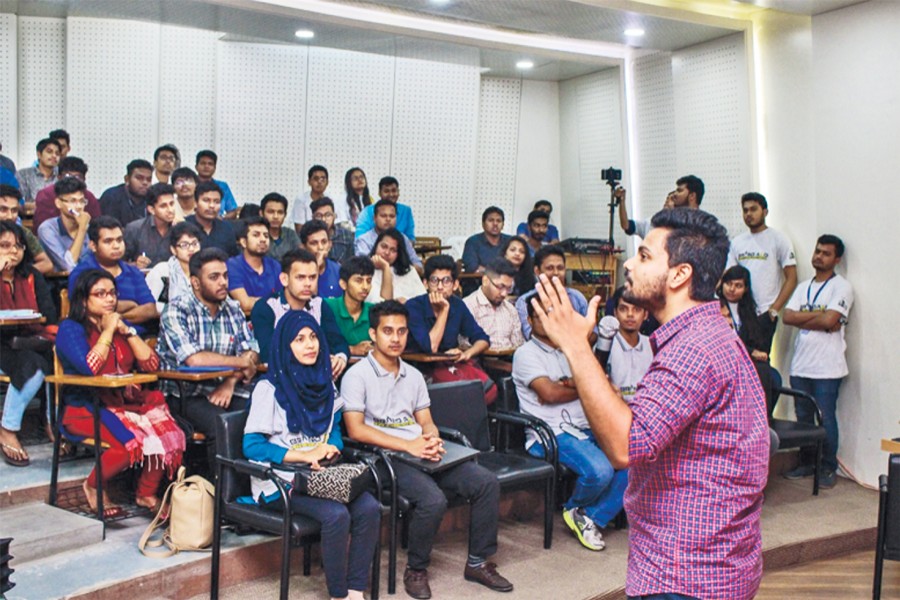 Participants of the Brand Aid 2018 workshop at East West University listening to Jawaad Bin Hamid, group  organisational development manager of Rancon