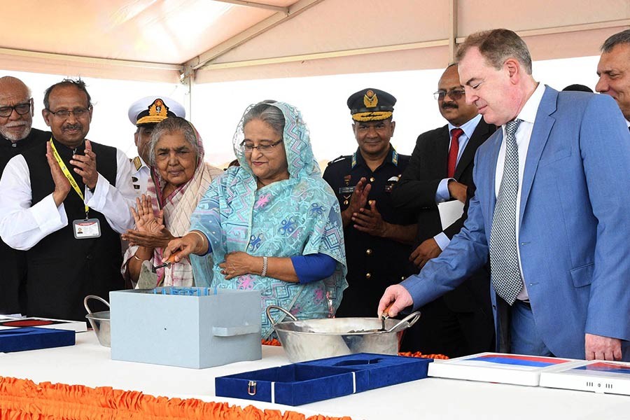 Prime Minister Sheikh Hasina and Russia's Deputy Prime Minister Yury Ivanovich Borisov jointly inaugurating the construction of the second reactor unit of Rooppur nuclear power plant on Saturday in Rooppur of Pabna. -Focus Bangla Photo