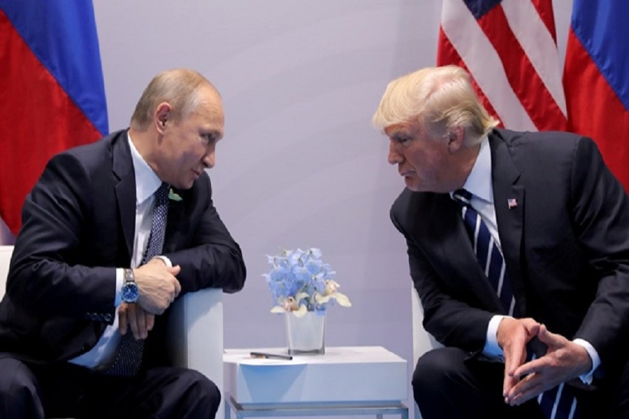 Russia's President Vladimir Putin talks to US President Donald Trump during their bilateral meeting at the G20 summit in Hamburg, Germany, Jul 7, 2017. Reuters/Files