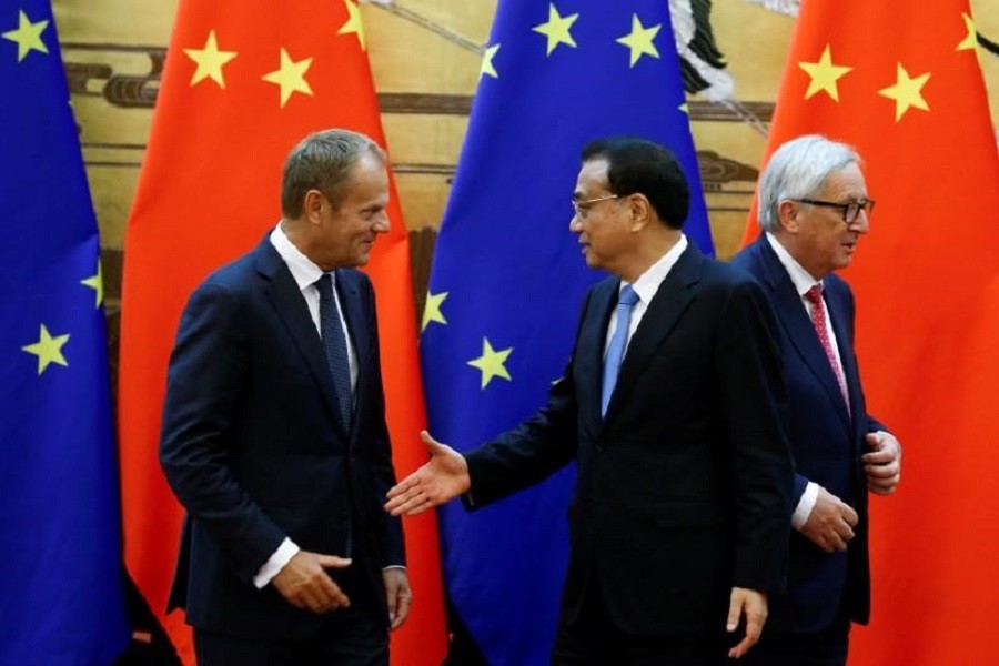 European Council President Donald Tusk, Chinese Premier Li Keqiang and European Commission President Jean-Claude Juncker attend a news conference at the Great Hall of the People in Beijing, China, July 16, 2018. Reuters