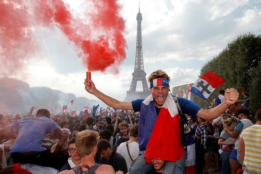 Massive crowds in Paris celebrating France's FIFA World Cup victory on July 15, 2018. -Reuters Photo