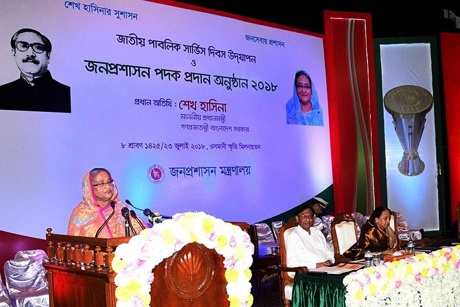 Prime Minister Sheikh Hasina addressing a function on National Public Service Day and distribution of the Public Administration Medal-2018 at Osmani Memorial Hall in Dhaka on Monday. -Focus Bangla Photo