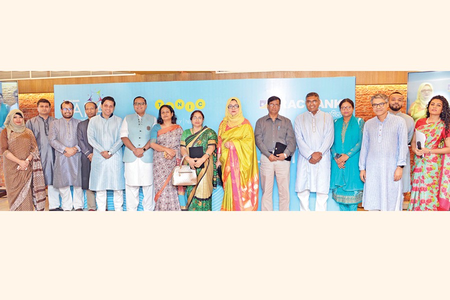 Head of Retail Banking of BRAC Bank Limited Nazmur Rahim and CEO of Telenor Health Sajid Rahman with senior executives of both the organisations posing for a photograph at a healthcare programme organised by BRAC Bank Limited in association with Telenor Health, for the customers of the bank's women banking proposition, TARA, at the bank's head office in the city recently