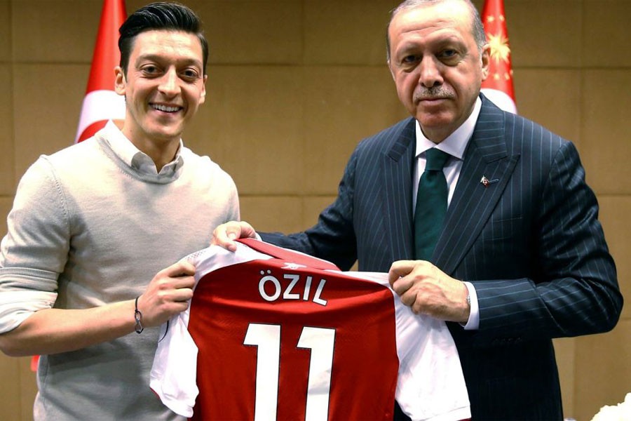 Mesut Ozil was criticised for posing for photos with Erdogan before the tournament and Turkish elections - AP photo