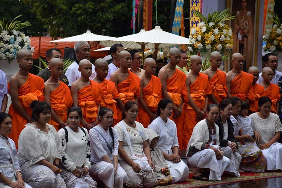 Members of a Thai soccer team rescued from a cave attending a Buddhist ordination ceremony at a temple at Mae Sai, in the northern province of Chiang Rai, Thailand on Wednesday. -Reuters Photo