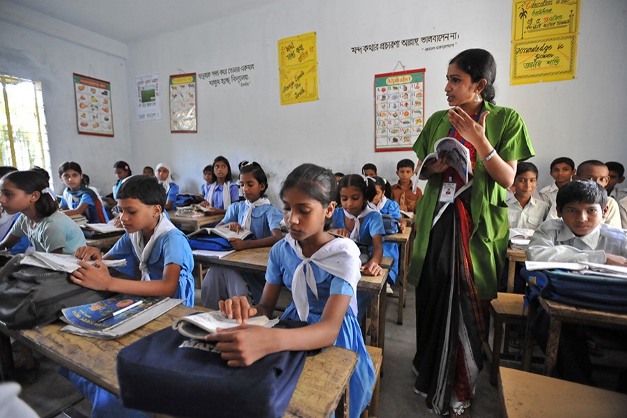 Students listening attentively to their teacher in class — ADB photo via Flickr