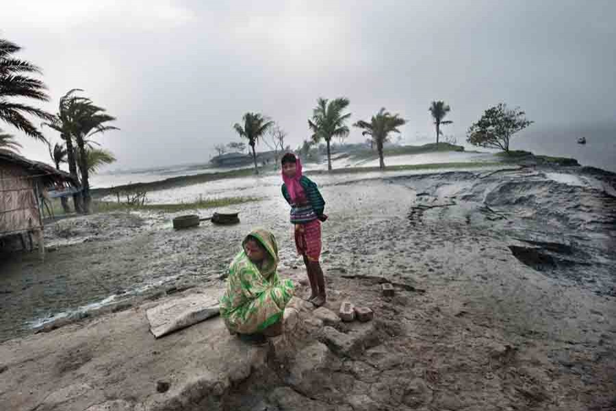 A mother and her son at the village of Bainpara in the delta of Bangladesh. Photo: Collected