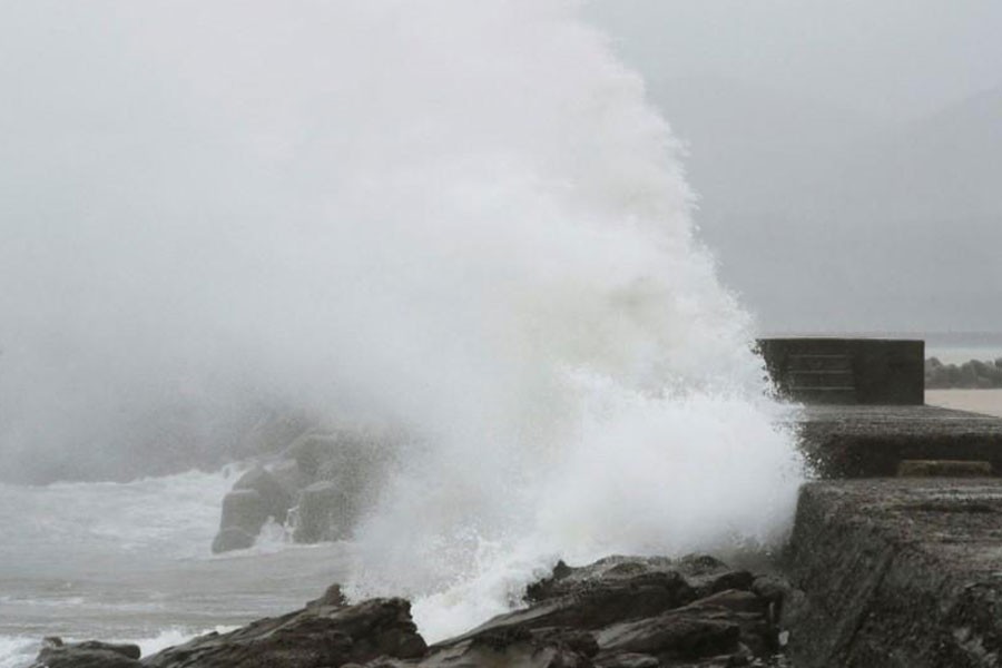 A wave, caused by Typhoon Noru, splashes the coast in Kushima, Miyazaki prefecture, Japan, August 6, 2017 in this photo taken by Kyodo - Mandatory credit Kyodo/via Reuters