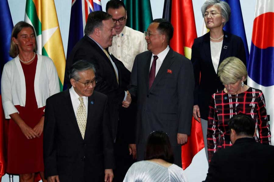 US Secretary of State Mike Pompeo shakes hands with North Korea's Foreign Minister Ri Yong Ho at the Asean Regional Forum Retreat in Singapore August 4, 2018. Reuters