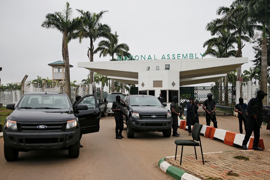 Members of security forces block the entrance of the National Assembly in Abuja, Nigeria on Tuesday — Reuters