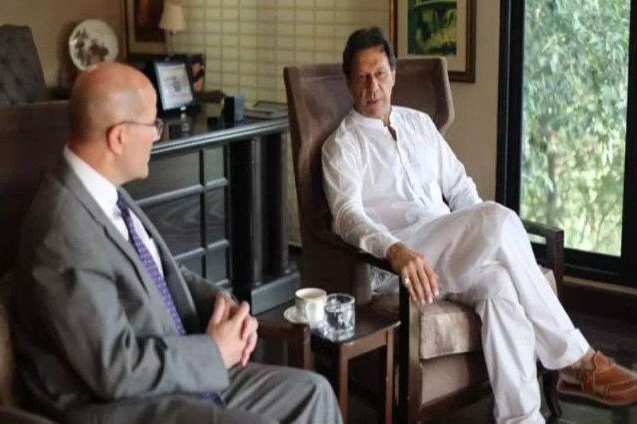 Pakistani prime minister-in-waiting Imran Khan holding talks with acting US Ambassador in Pakistan John F Hoover in Islamabad on Wednesday	— AFP