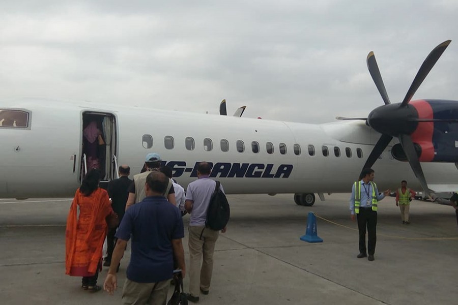 Passengers boarding a domestic flight of US-Bangla Airlines at Dhaka's Hazrat Shahjalal International Airport. Picture used for representational purpose — Collected