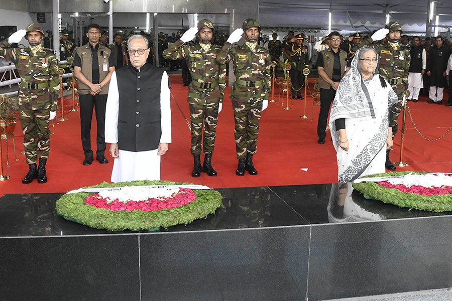 President Md Abdul Hamid and Prime Minister Sheikh Hasina pay their tributes to Bangabandhu Sheikh Mujibur Rahman at Dhanmondi 32 on National Mourning Day, marking the death anniversary of the nation's founding father on Wednesday — Focus Bangla photo