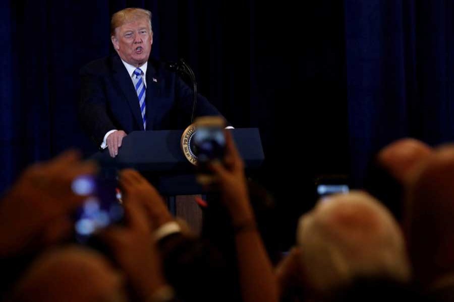 US President Donald Trump delivers remarks during a meeting with supporters in Utica, New York, US, August 13, 2018. Reuters