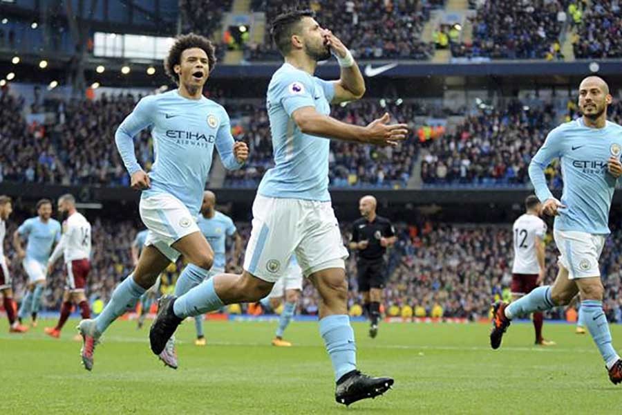 City crushes Huddersfield riding on Aguero hat-trick