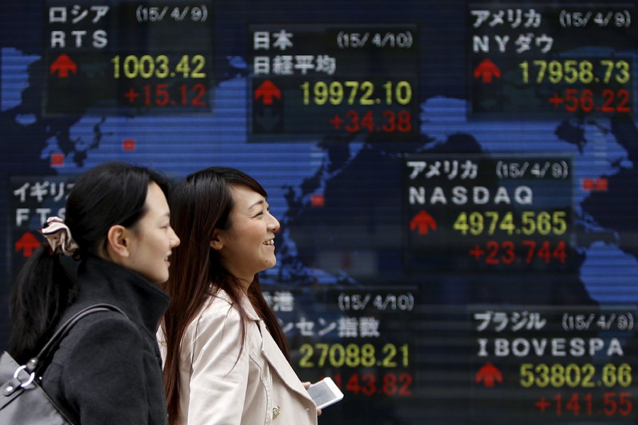 Nikkei edges up as weak yen helps mood