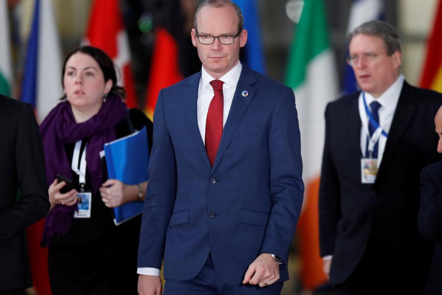 Ireland's Minister for Foreign Affairs Simon Coveney arrives to attend the Eastern Partnership summit at the European Council Headquarters in Brussels, Belgium, November 24, 2017 – Reuters file photo