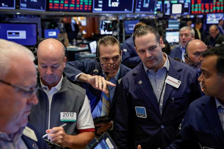 Traders work on the floor of the New York Stock Exchange (NYSE) in New York, US, August 31, 2018. Reuters