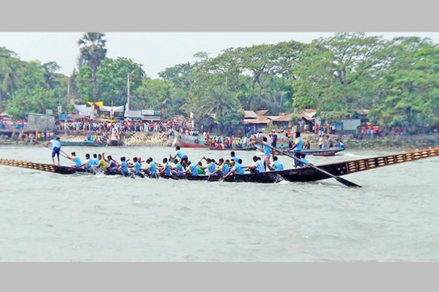 Traditional boat race (Nouka Baich) taking place. Photo: Star Mail