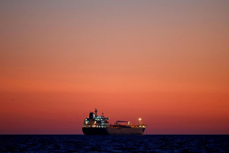 An oil tanker is seen at sunset anchored off the Fos-Lavera oil hub near Marseille, France   	— Reuters