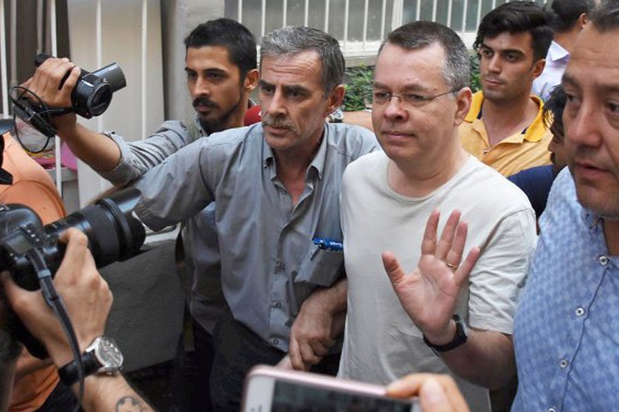 US pastor Andrew Brunson reacts as he arrives at his home after being released from the prison in Izmir, Turkey July 25, 2018 - Demiroren News Agency/DHA via Reuters